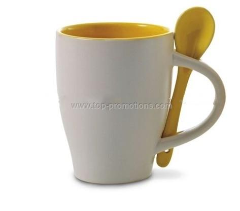 White ceramic cup and spoon